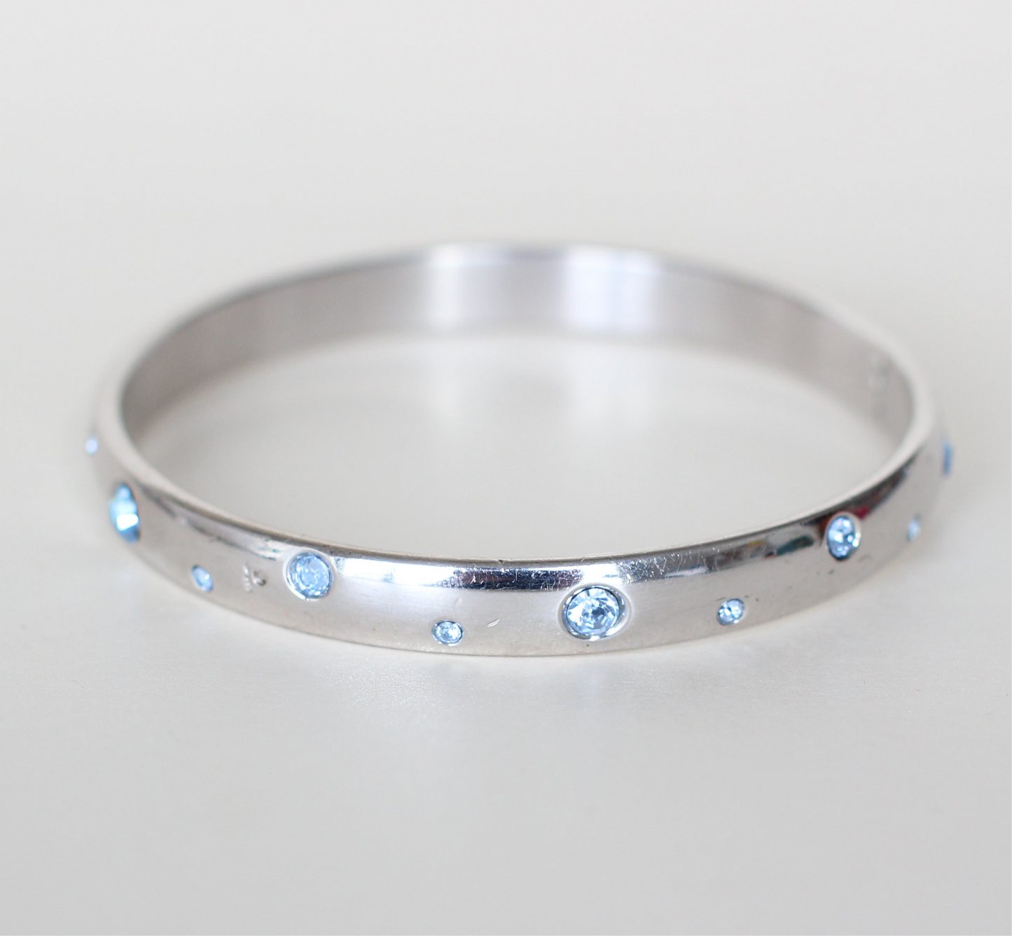 Yves Saint Laurent Sterling Silver & Swarovski Bangle – Sky Blue Crystals, Signed, 1990s