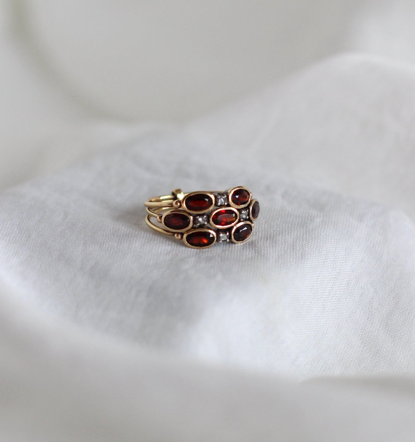 Mystical "Harem" Ring in 19 Carats Gold, Diamonds, and Fire Garnets