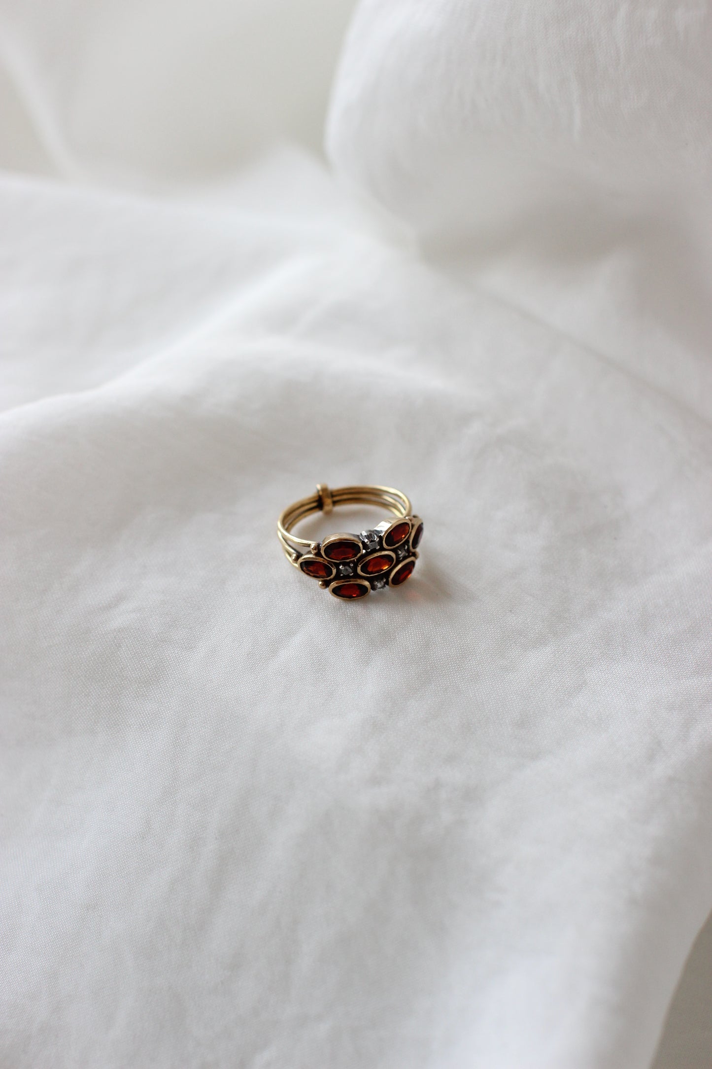 Mystical "Harem" Ring in 19 Carats Gold, Diamonds, and Fire Garnets