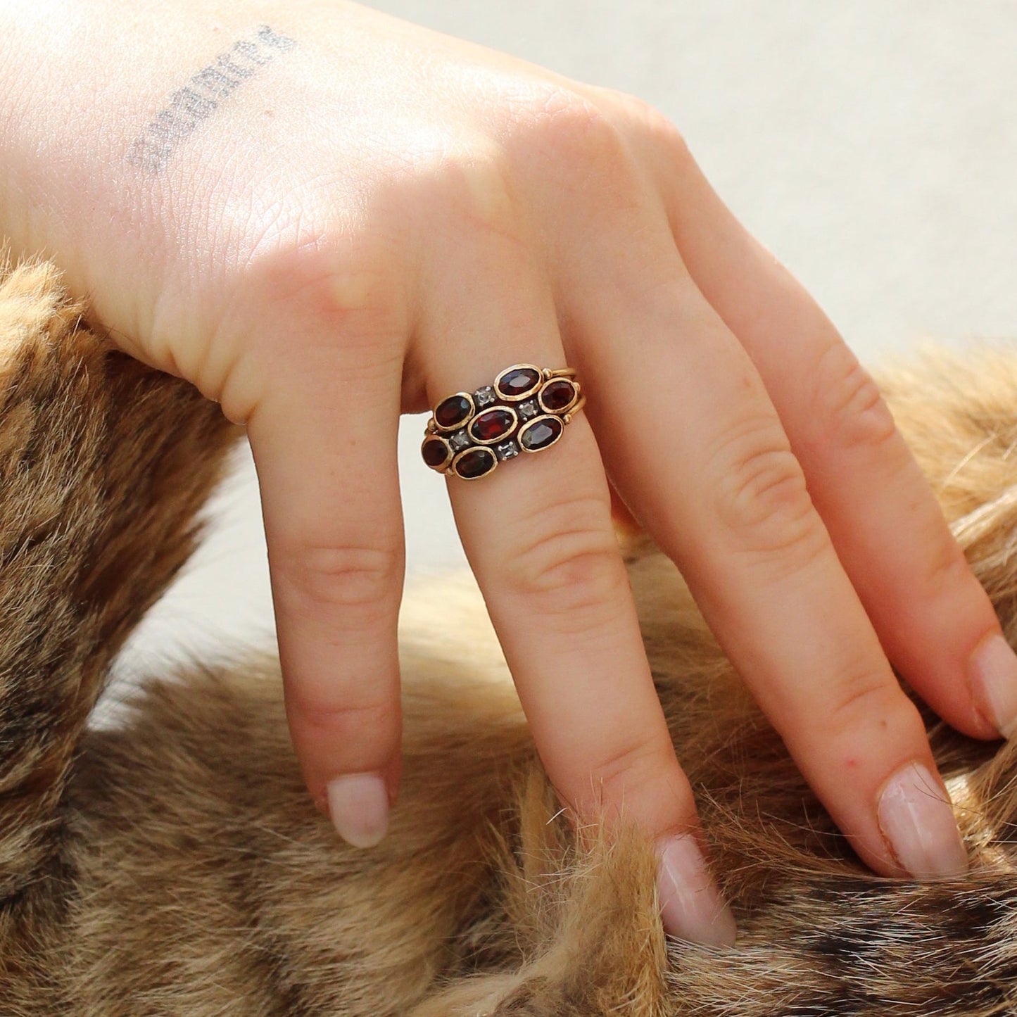 Mystical "Harem" Ring in 19 Carats Gold, Diamonds, and Fire Garnets