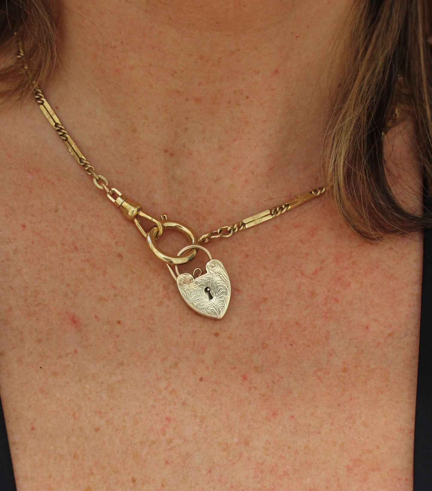 Early 1900s English 9k Gold Heart Lock Pendant with Arabesque Engravings