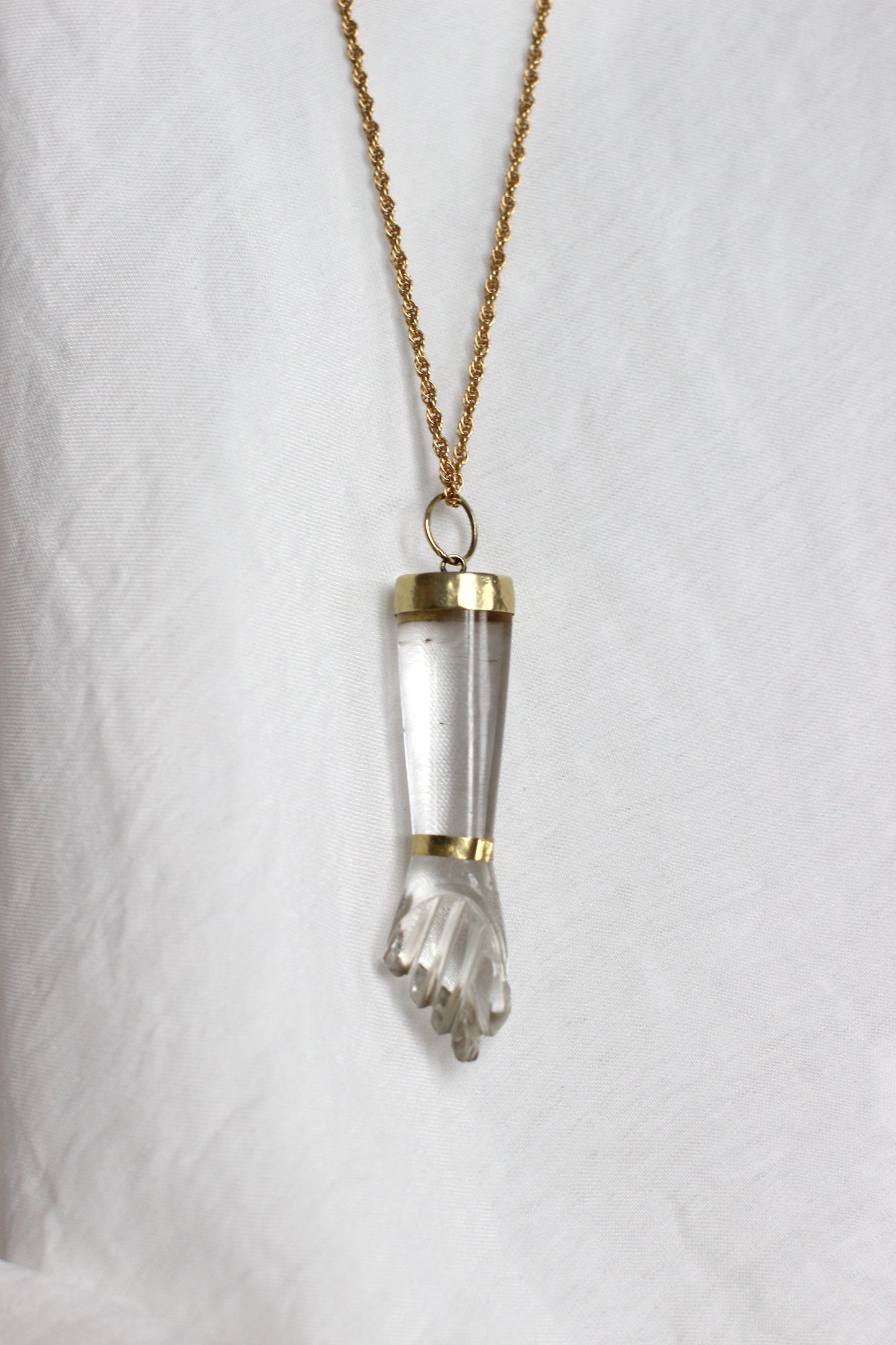 "Figa" 18k yellow gold and rock crystal pendant