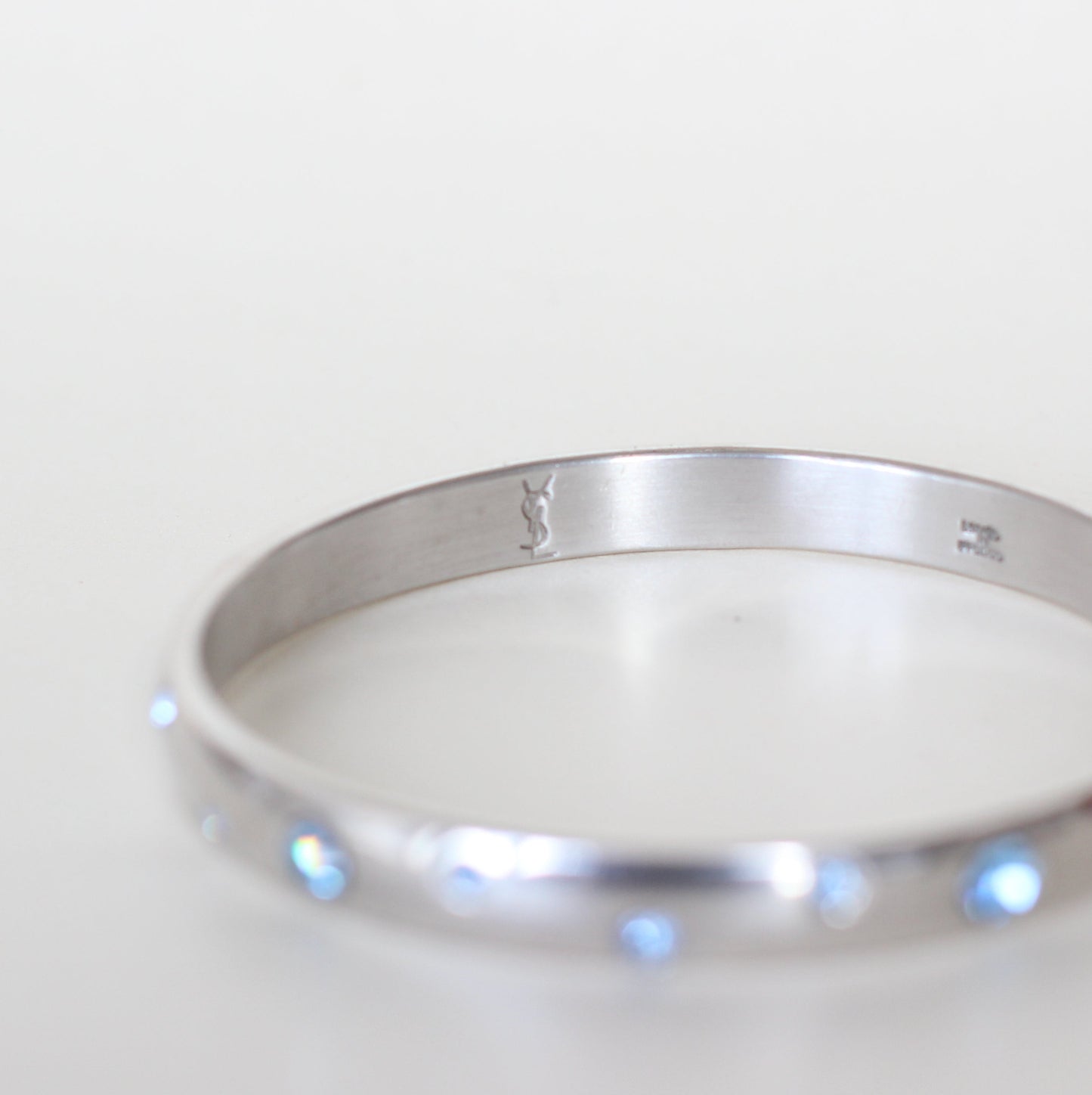 Yves Saint Laurent Sterling Silver & Swarovski Bangle – Sky Blue Crystals, Signed, 1990s