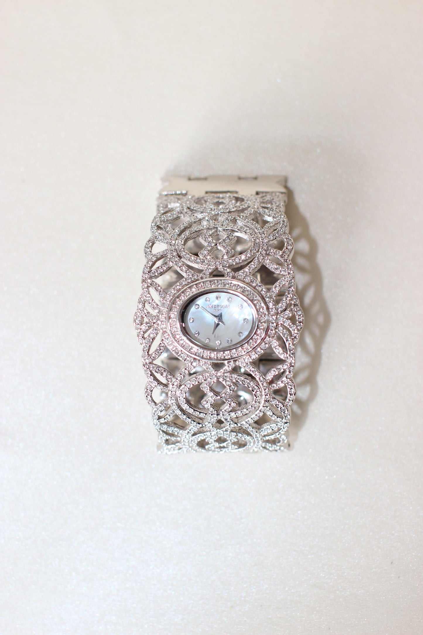 Ambrosio Paris Oriental-Inspired Jewelry Watch – Fully Set with Rhinestones, Mother-of-Pearl Dial