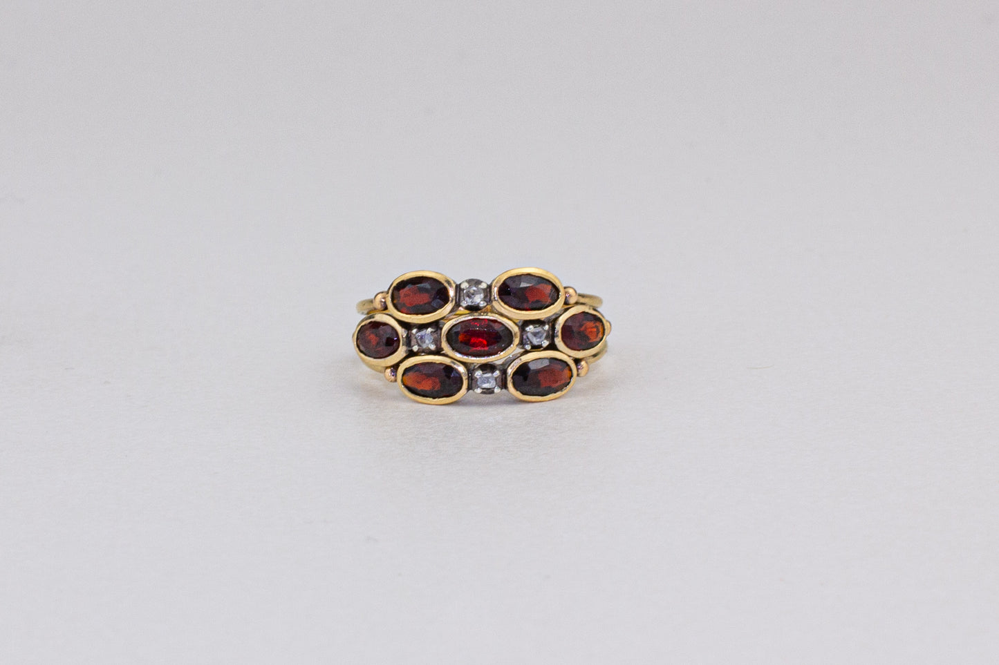 Mystical "Harem" Ring in 19 Carats Gold, Diamonds, and Fire Garnets