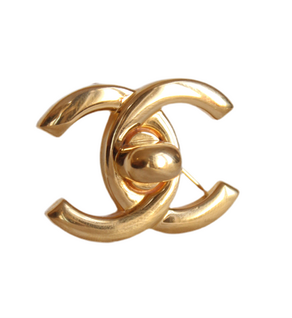 Vintage CHANEL Turnlock Brooch – Iconic 1996 Design in 24K Gold-Plated Metal