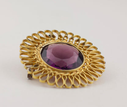 Broche vintage "Soleil" des années 1980 avec verre violet