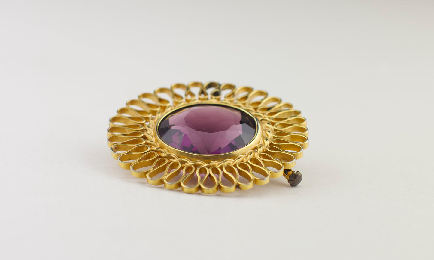 Broche vintage "Soleil" des années 1980 avec verre violet