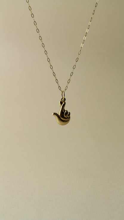 Rare 90's necklace from the Official National Lottery England, featuring the iconic “lucky hand” symbol!