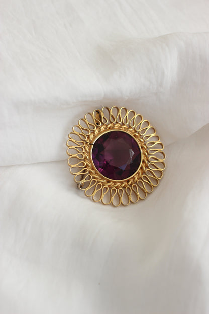 Broche vintage "Soleil" des années 1980 avec verre violet