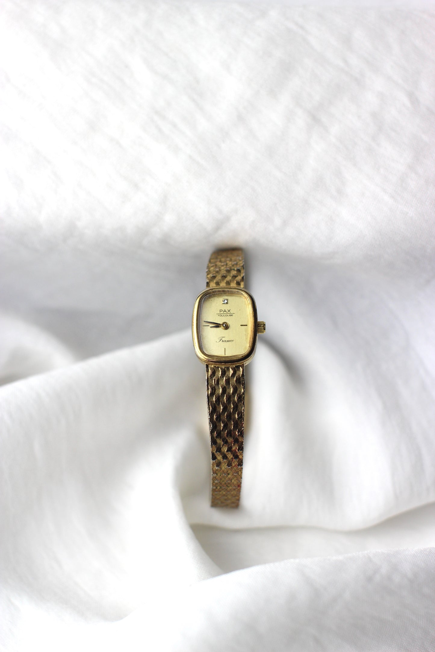 Vintage Pax Quartz Watch in Gold-Tone Steel with Strass Accent and Braided Bracelet