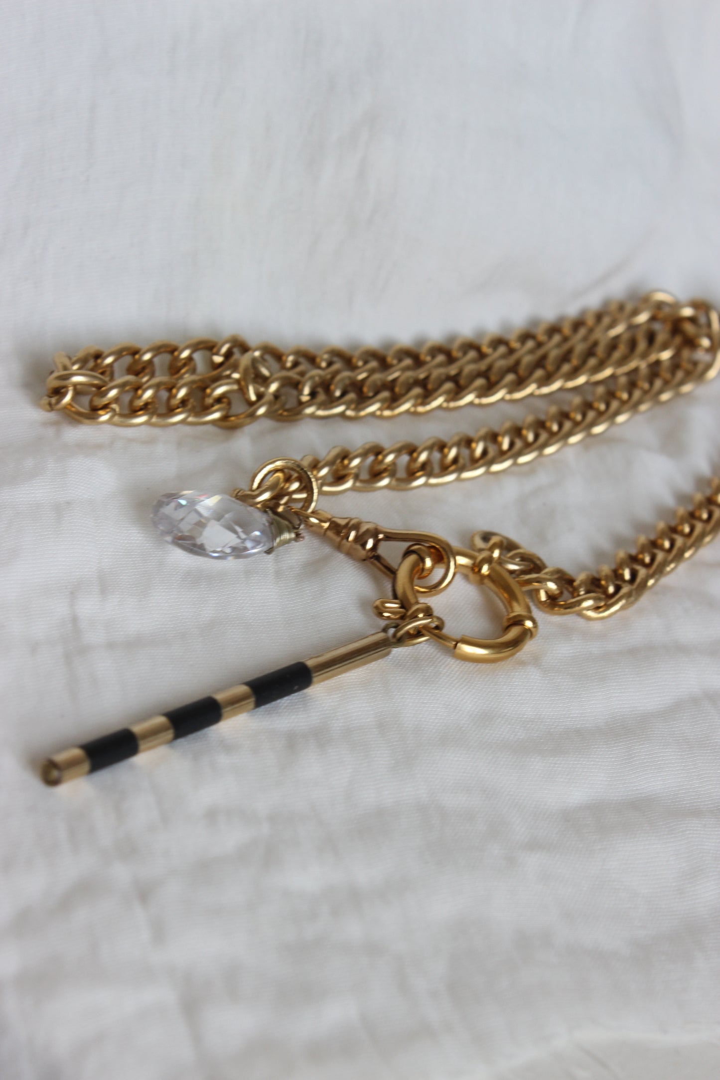 Creation #008 Vintage Gold Plated Pocket Watch Chain with Limpid Crystal Tear & cylinder bar in black and gold plated gold