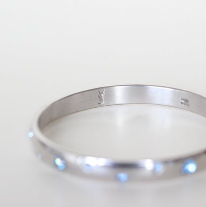 Yves Saint Laurent Sterling Silver & Swarovski Bangle – Sky Blue Crystals, Signed, 1990s