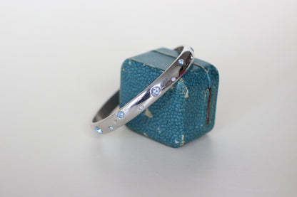 Yves Saint Laurent Sterling Silver & Swarovski Bangle – Sky Blue Crystals, Signed, 1990s