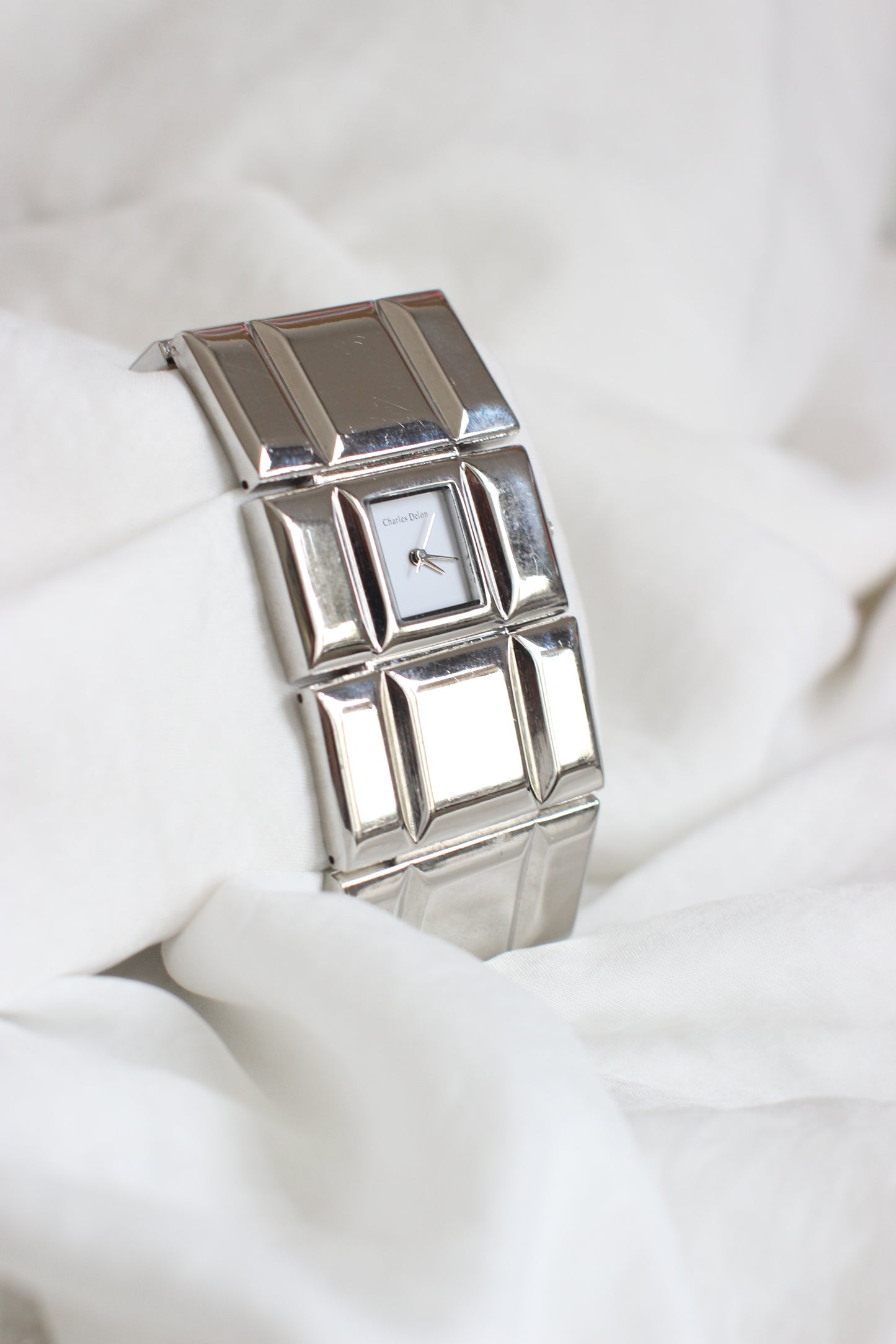 Charles Delon 1980s Silver-Tone Cubic Modernist Cuff Watch – White Dial