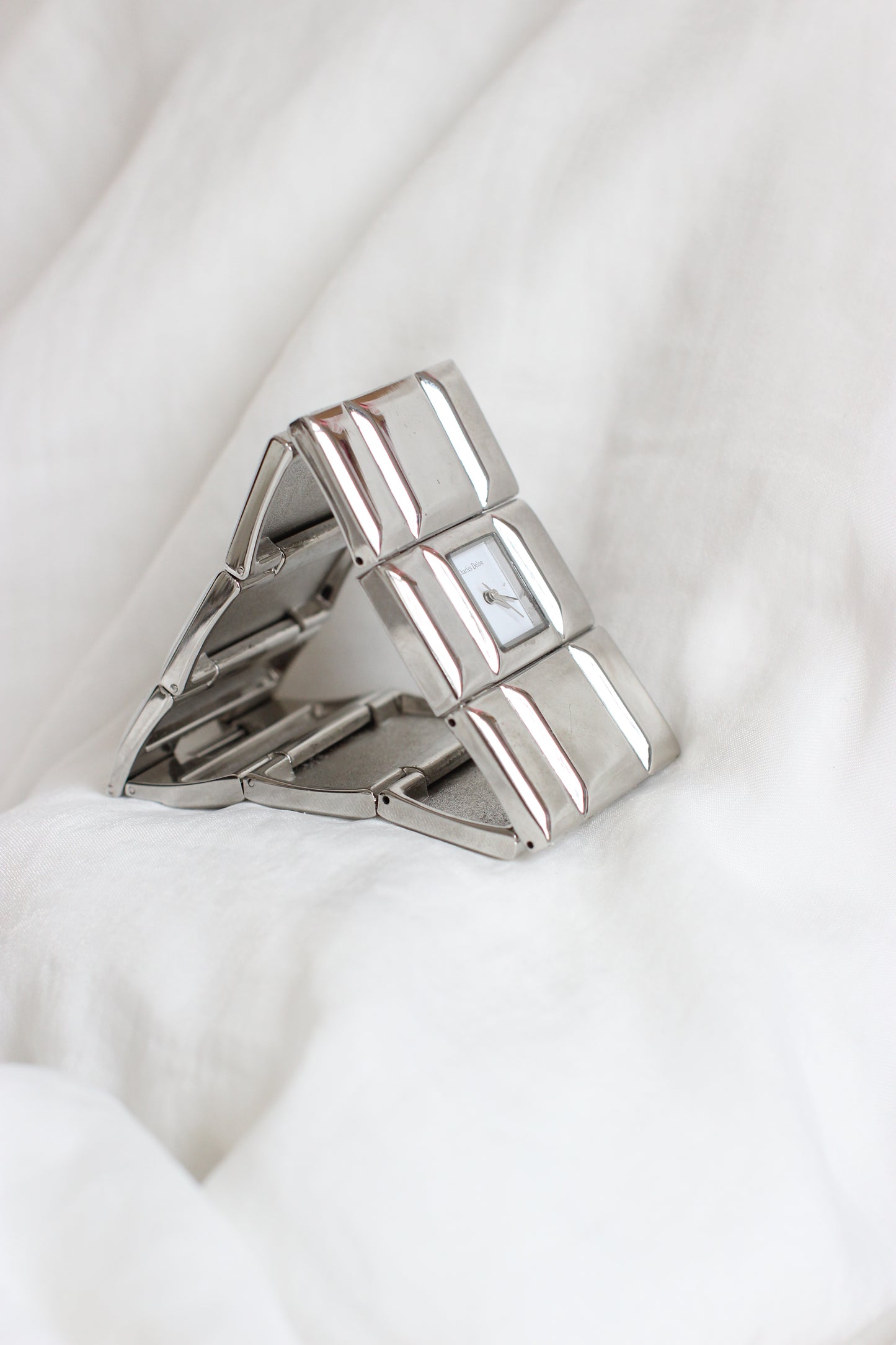 Charles Delon 1980s Silver-Tone Cubic Modernist Cuff Watch – White Dial