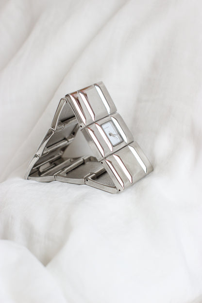 Charles Delon 1980s Silver-Tone Cubic Modernist Cuff Watch – White Dial