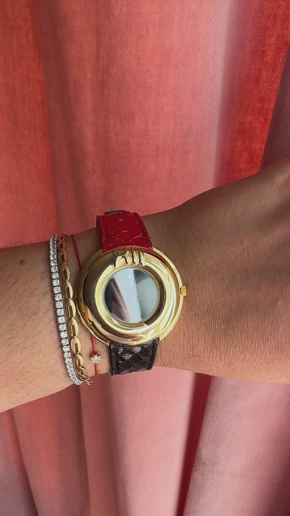 Montre Piranha vintage des années 1980 avec bracelet en cuir bicolore effet python